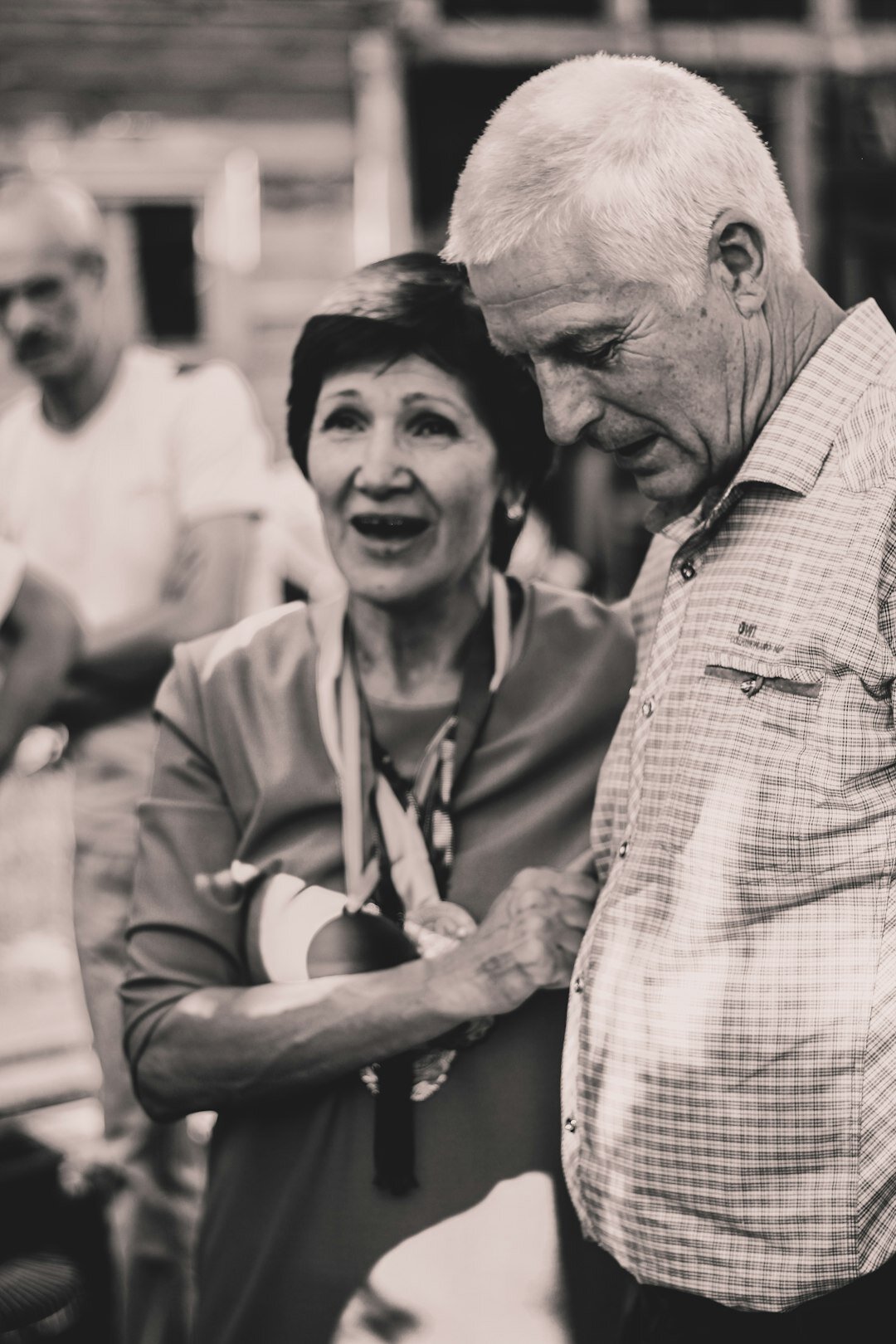 Elderly couple dancing at a community dance evening